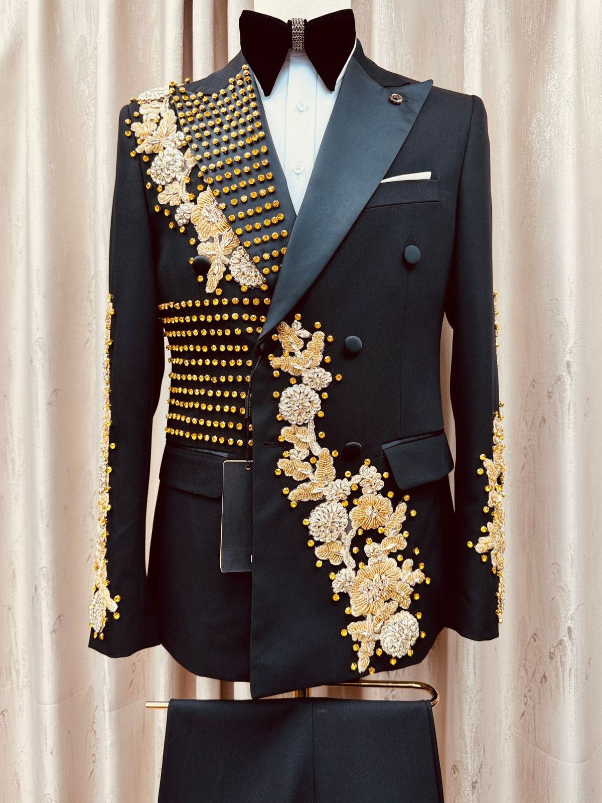 Black suit with gold rhinestone accents